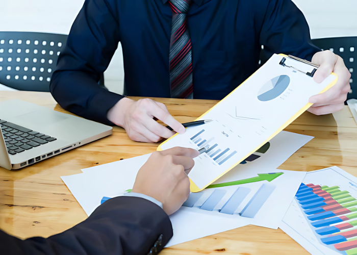 Man checking documentation papers on the table at Dreamway Consultancy